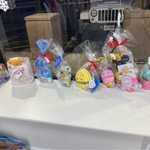 Assorted valentines Baskets with Plush Toys 
This ad is the yellow dinosaur